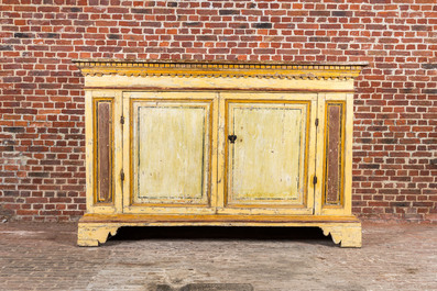 An Italian polychrome wooden two-door sideboard, 17th C.