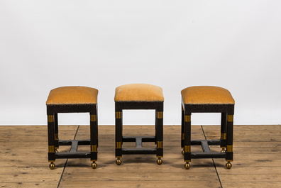 Three square black painted brass mounted wooden stools, 20th C.