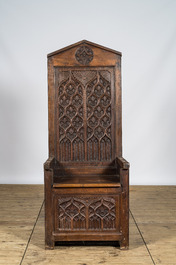 A large Gothic Revival walnut bishop chair or cathedra, 19th C.