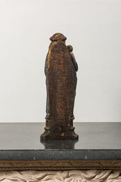 A polychromed wooden Madonna and Child on stand, 17th C.
