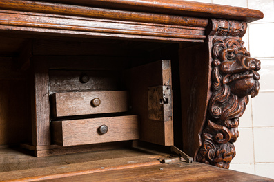 A Flemish oak 'columns' cupboard, 17th C. with later elements