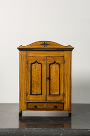 A miniature pine wood two-door cupboard, 19th C.