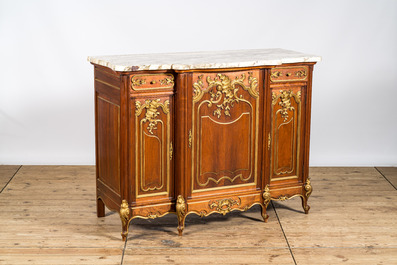 A pair of marble-topped partly gilded wooden side cabinets, 19/20th C.