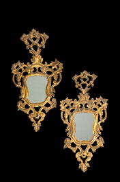 A pair of Italian Louis XV-style gilt and open worked wooden wall mirrors, 18th C.