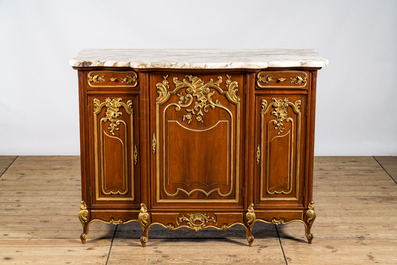 A pair of marble-topped partly gilded wooden side cabinets, 19/20th C.