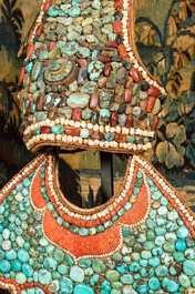 A headpiece and breastplate mounted with turquoise, coral and other stones, Nepal, 19/20th C.