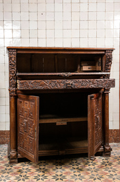 A Flemish oak 'columns' cupboard, 17th C. with later elements