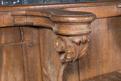 An impressive Flemish oak pew, 18th C.