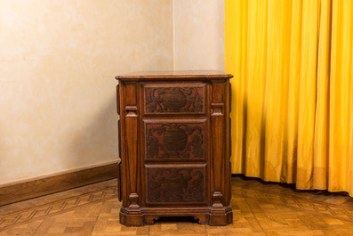 A wooden desk with six drawers with painted panels, 19th C.