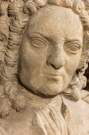 A pair of French stone busts of noblemen, 18th C.