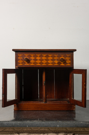 An inlaid wooden display cabinet, 19th C.