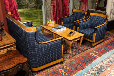 A root wood veneer and partly ebonised wooden salon with two armchairs and a sofa, 19/20th C.