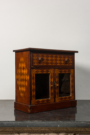 An inlaid wooden display cabinet, 19th C.