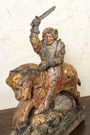 Groupe en bois sculpt&eacute; et polychrom&eacute; figurant Saint George terrassant le dragon, probablement Allemagne, 17/18&egrave;me