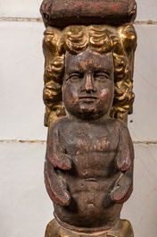 A polychrome and gilt walnut cherubim choir balustrade, probably 17th C.