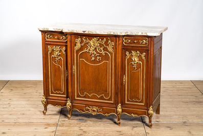 A pair of marble-topped partly gilded wooden side cabinets, 19/20th C.