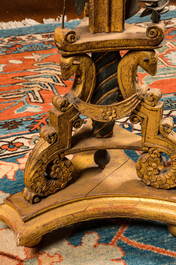 A gilt and painted wooden stand with leaf ranks, 19th C.