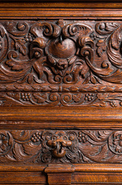 A Flemish oak 'columns' cupboard, 17th C. with later elements