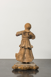 A carved wooden figure of an angel with traces of polychromy, 17/18th C.