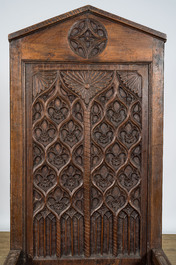 A large Gothic Revival walnut bishop chair or cathedra, 19th C.