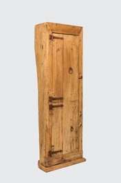 A rural oak cabinet with two doors made from a tree trunk, 19th C.