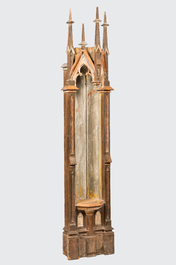 A patinated wooden Gothic Revival base with canopy, 19th C.