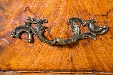 A Dutch mahogany veneered cabinet with two doors and three drawers, 18th C.