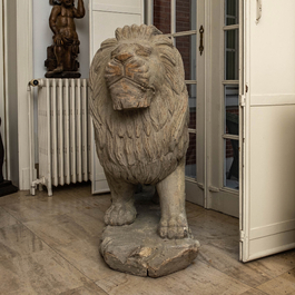A pair of large patinated wooden lions, 19th C.