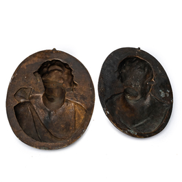 After Louis-Fran&ccedil;ois Roubiliac (1702/05-1762): A pair of bronze plaques depicting 'The laughing child' and 'The crying child', 19th C.
