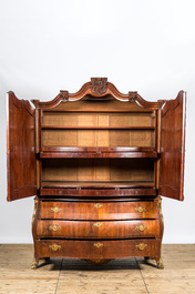 A Dutch mahogany veneered cabinet with two doors and three drawers, 18th C.