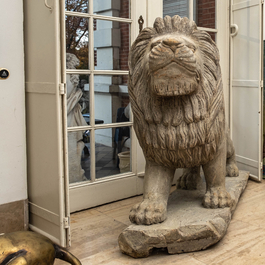 A pair of large patinated wooden lions, 19th C.