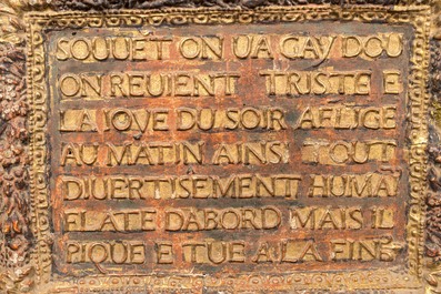 A red lacquered and gilt canvas on wood panel with Protestant text, South East of France, 18th C.