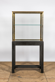 A French brass display cabinet on later wooden stand, 20th C.