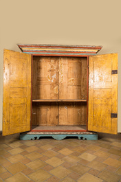 A pair of large Italian polychrome wooden two-door cupboards with coats of arms, 17th C.