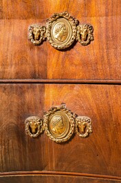 A Dutch mahogany veneered cabinet with two doors and three drawers, 18th C.