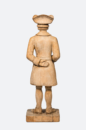 A bleached oak wooden sculpture of a gentleman, 20th C.