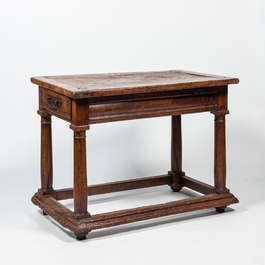 A rectangular oak table on column-shaped legs, 17th  C.