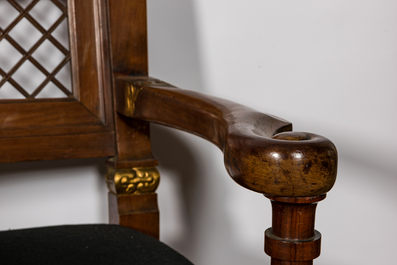 A lavish partly gilt upholstered mahogany bench, probably France, 19th C.