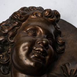 After Louis-Fran&ccedil;ois Roubiliac (1702/05-1762): A pair of bronze plaques depicting 'The laughing child' and 'The crying child', 19th C.