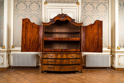 A Dutch mahogany veneered cabinet with two doors and three drawers, 18th C.