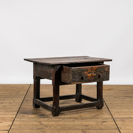 A Spanish wooden table with one drawer, 17/18th C.