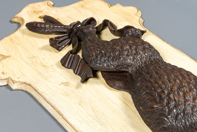 Two carved wooden 'Black Forest' hunting trophies of a goose and a hare, Switzerland, 19th C.