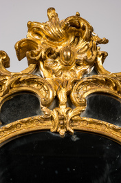 A French finely carved gilt wooden Louis XV-style rocaille mirror, 19th C.