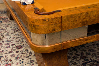 A burl wood veneered billiard table with accompanying lighting and cue holder, 20th C.