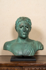 A large green patinated bronze bust of a Roman, 20th C.