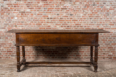 A four-drawer southern European walnut table, 18th C. and later