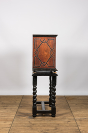 A Spanish partly ebonised wooden cabinet with tortoiseshell veneer and engraved bone plaques, 19th C.