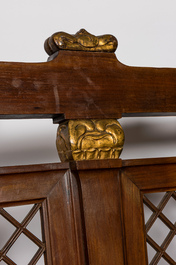 A lavish partly gilt upholstered mahogany bench, probably France, 19th C.