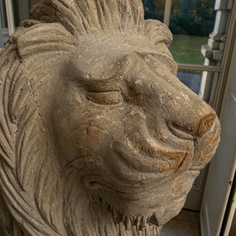 A pair of large patinated wooden lions, 19th C.