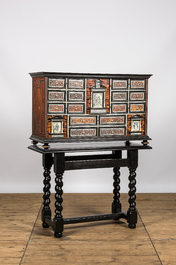 A Spanish partly ebonised wooden cabinet with tortoiseshell veneer and engraved bone plaques, 19th C.